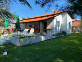 Casa na praia peito de moça com vista para o mar